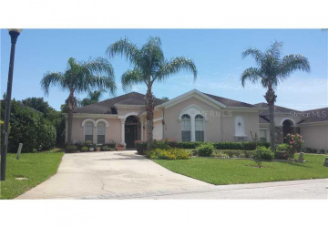 Exterior Front - Beautiful POOL HOME with Florida palm trees.