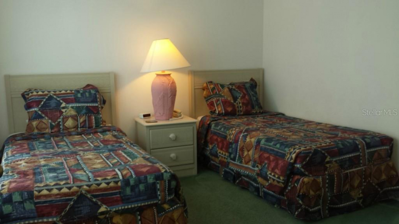This room is located in the front of the house with double windows and plenty of space for two twin beds.