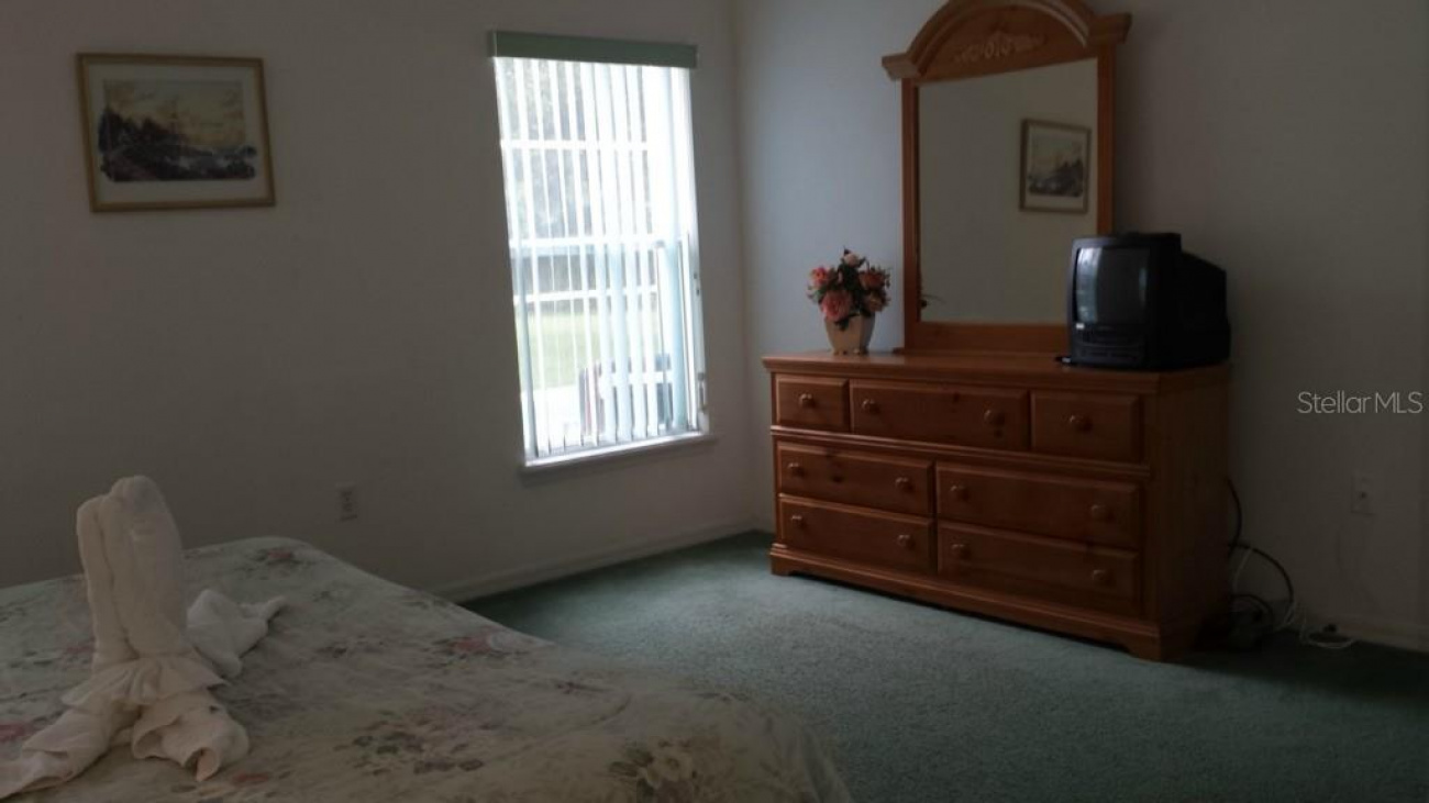The master bedroom offers a spacious area.