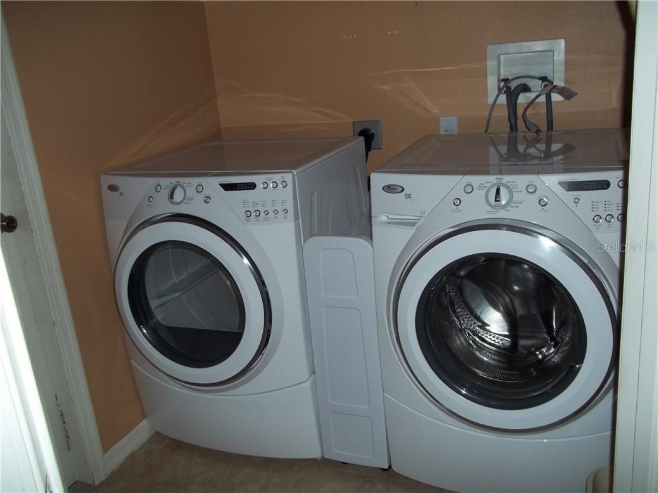 The property provides an indoor laundry room with a washer and dryer.