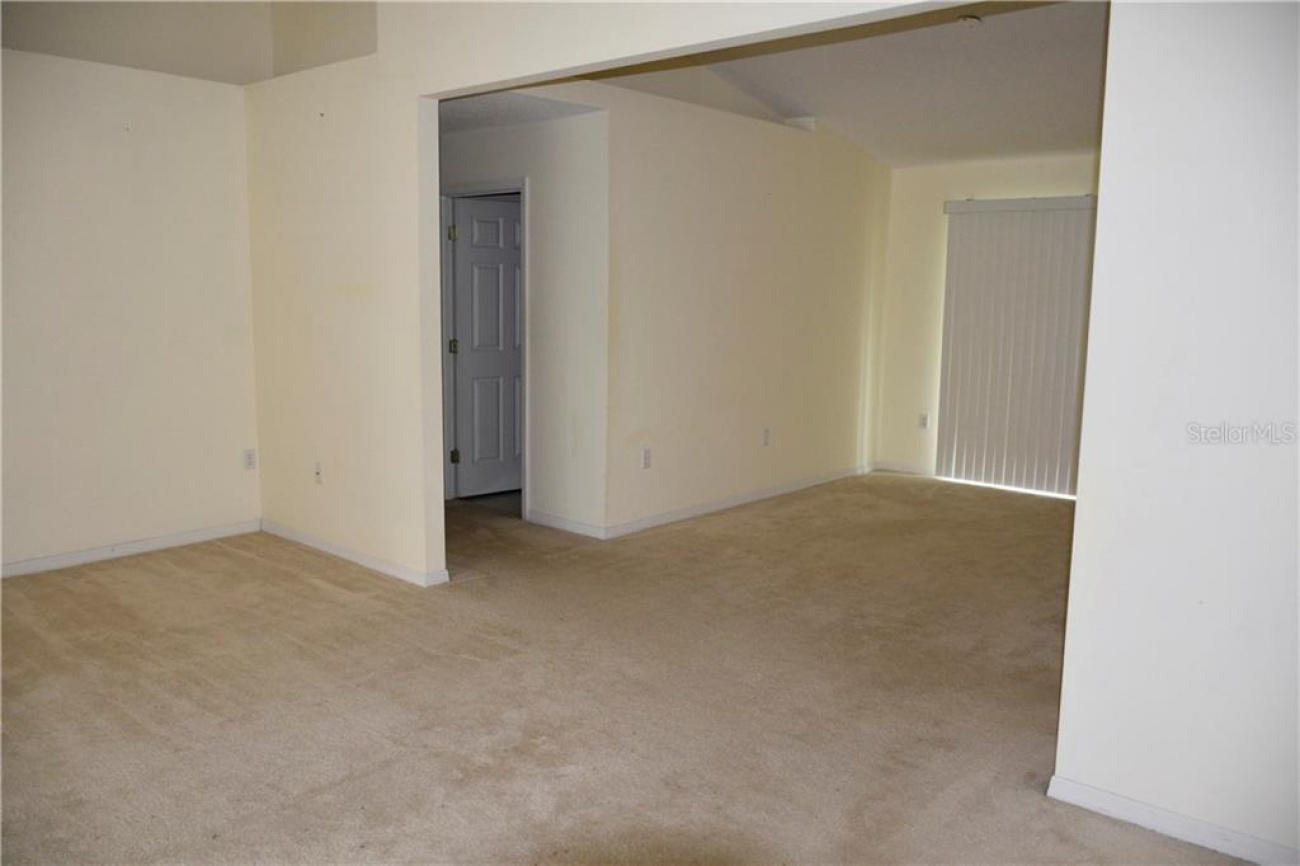This room is adjoining, the living area with access to the screened in area