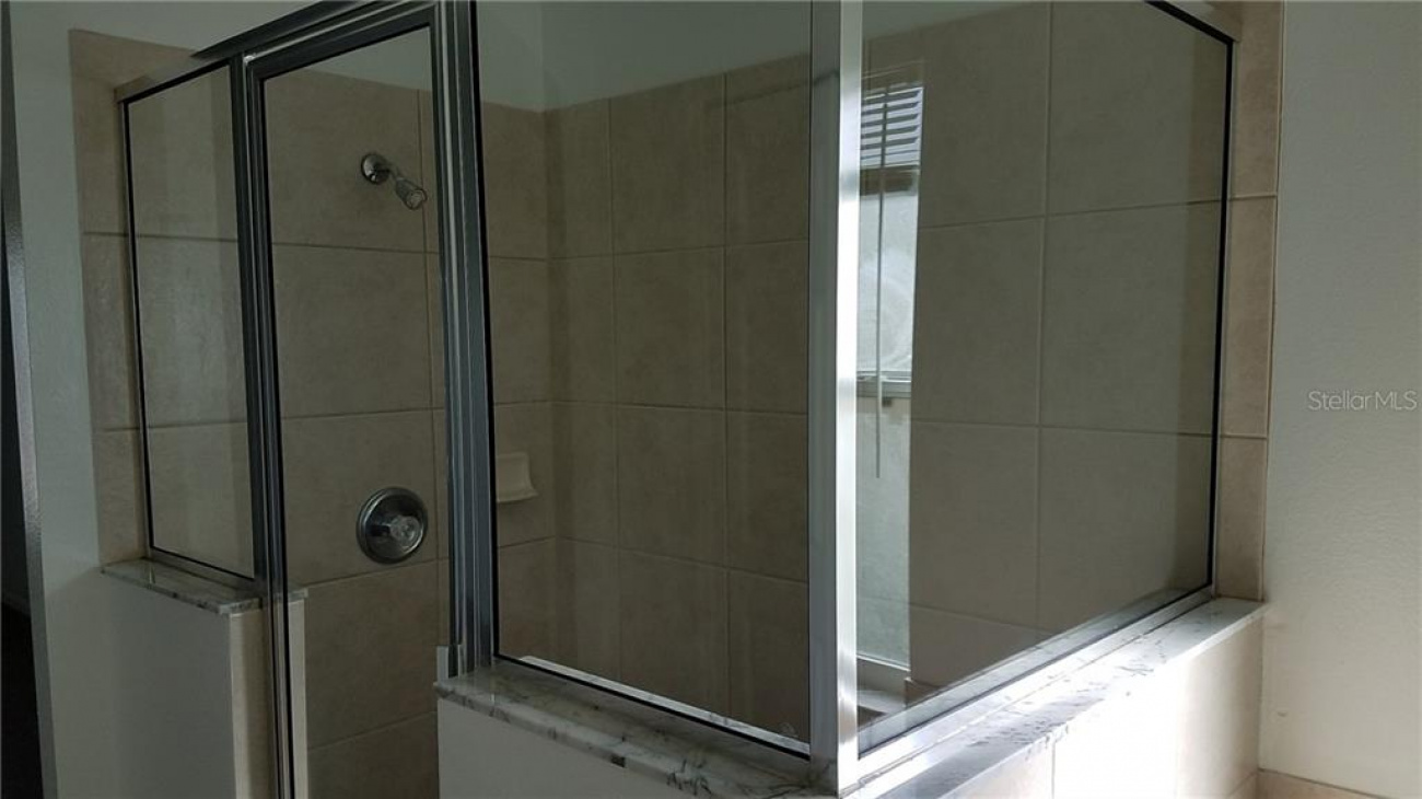 Separate shower stall in the master bedroom.